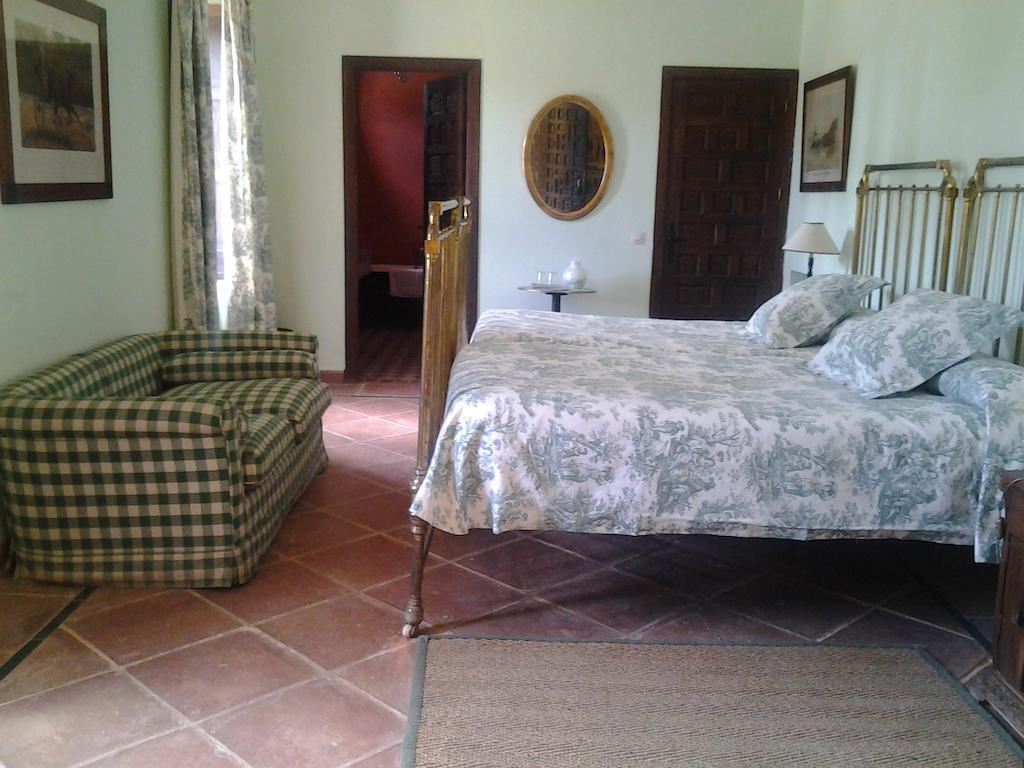Отель Hacienda La Indiana Лос-Паласьос-и-Вильяфранка Номер фото